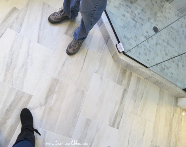 Grey tile bathroom floors